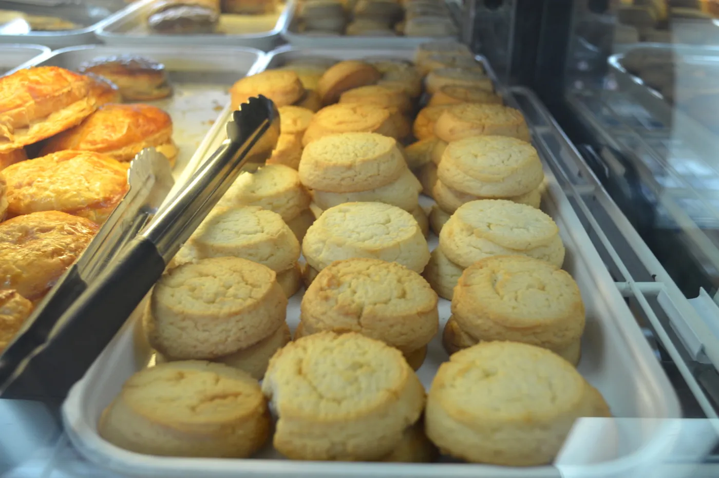 Trays of fresh-baked pastries in the case