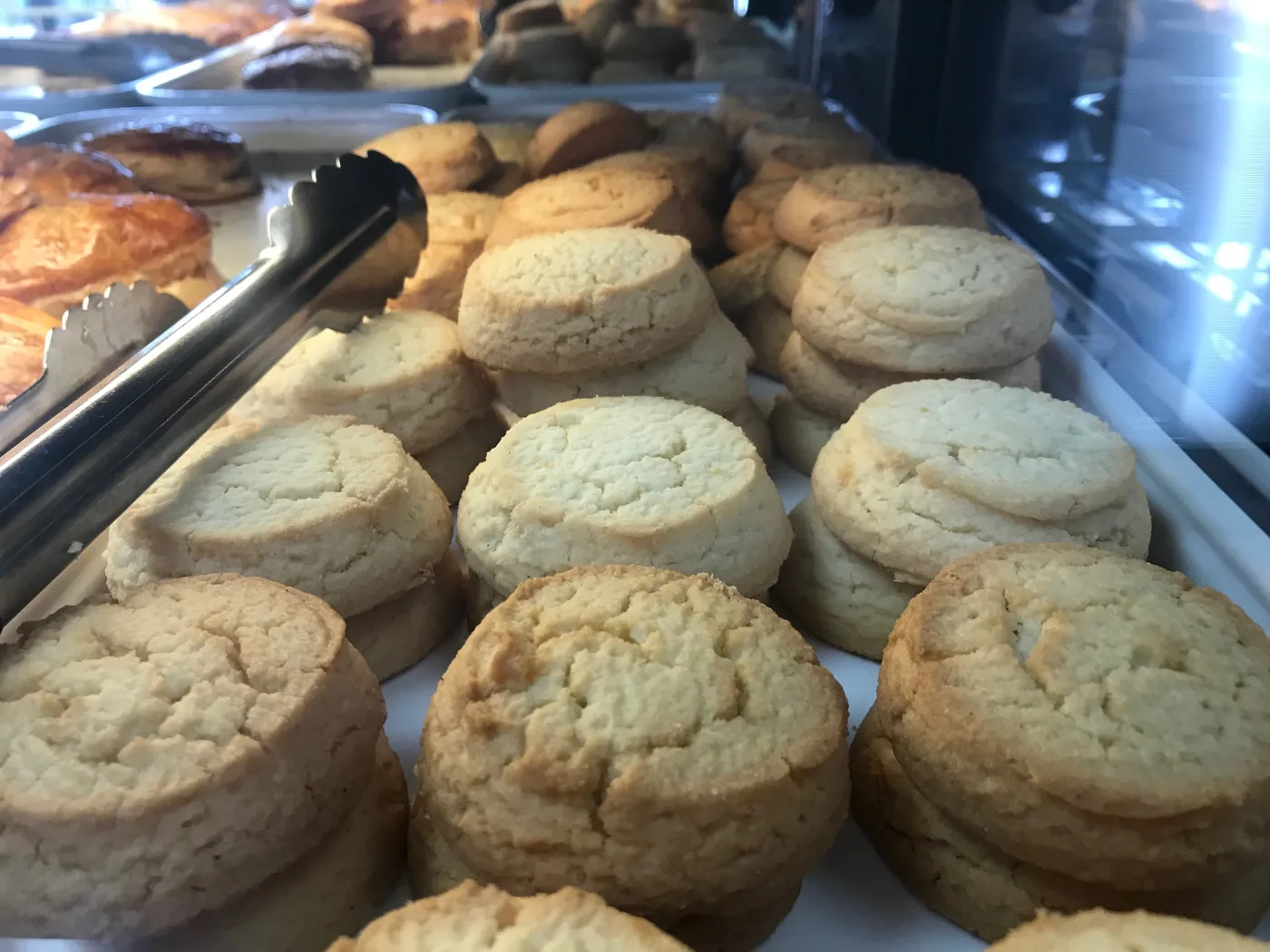 Baked goods on a tray in the case